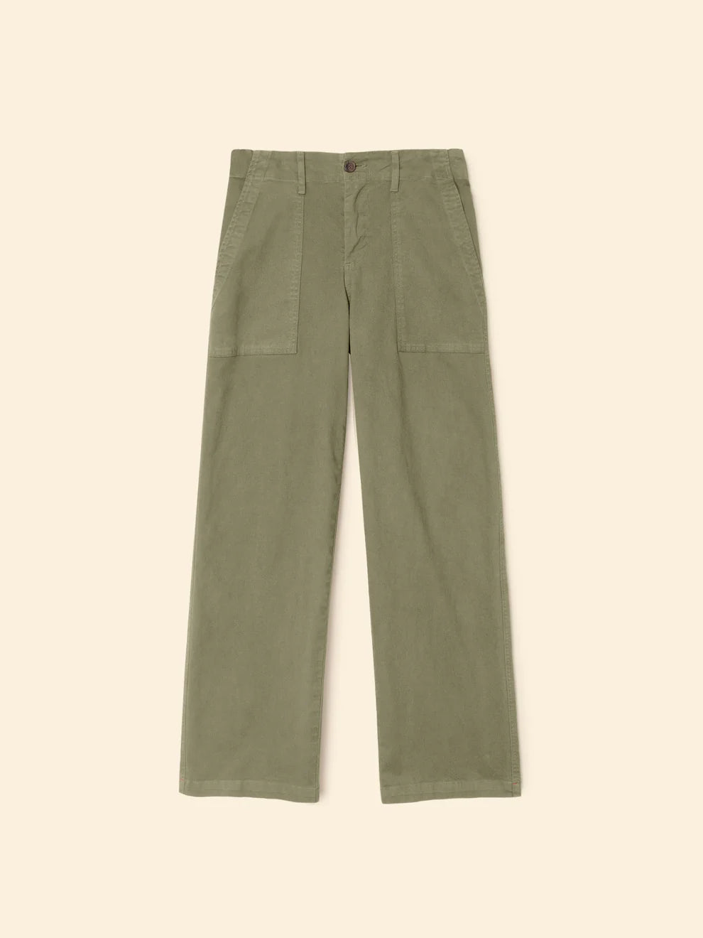Green pants on a beige background