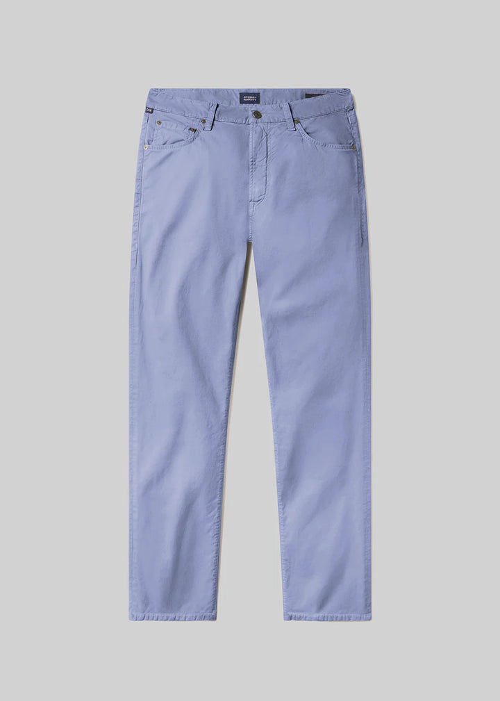 Light blue jeans on a gray background