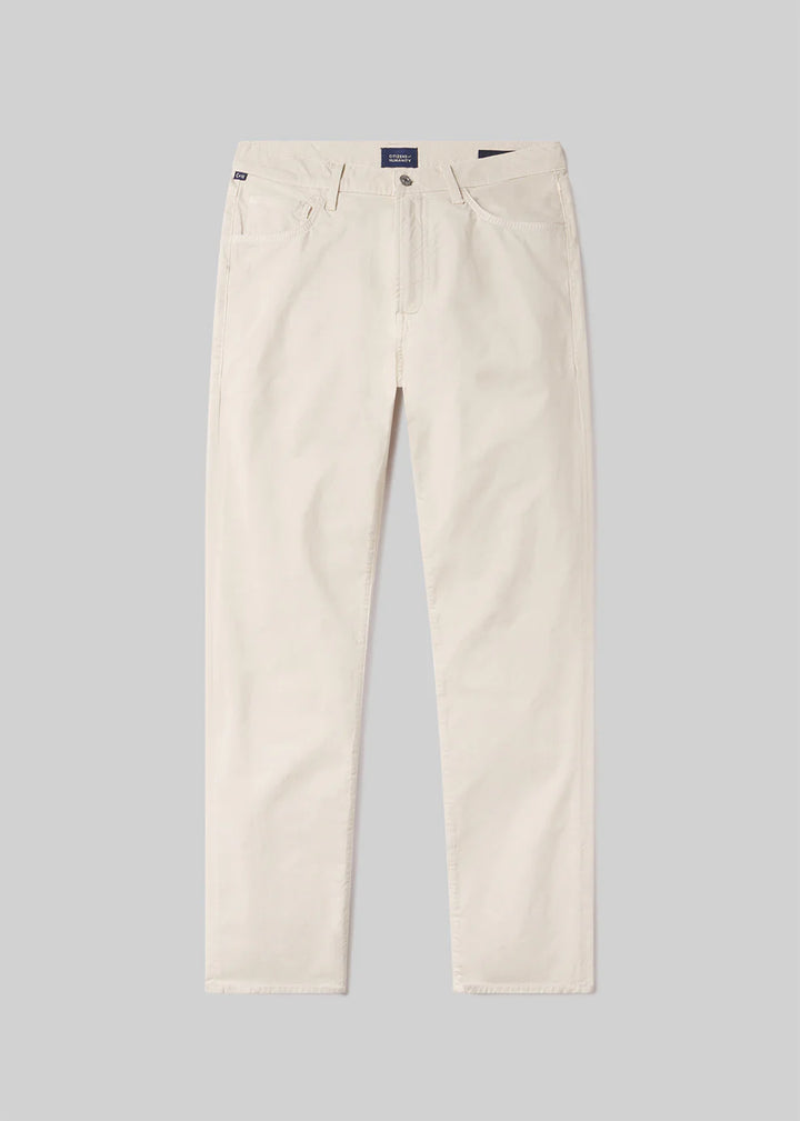 Beige pants on a gray background