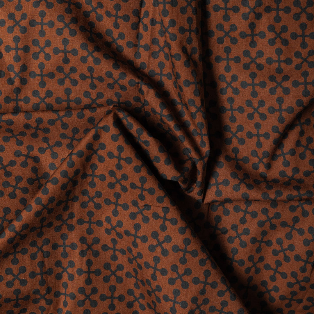 Brown fabric with black geometric pattern