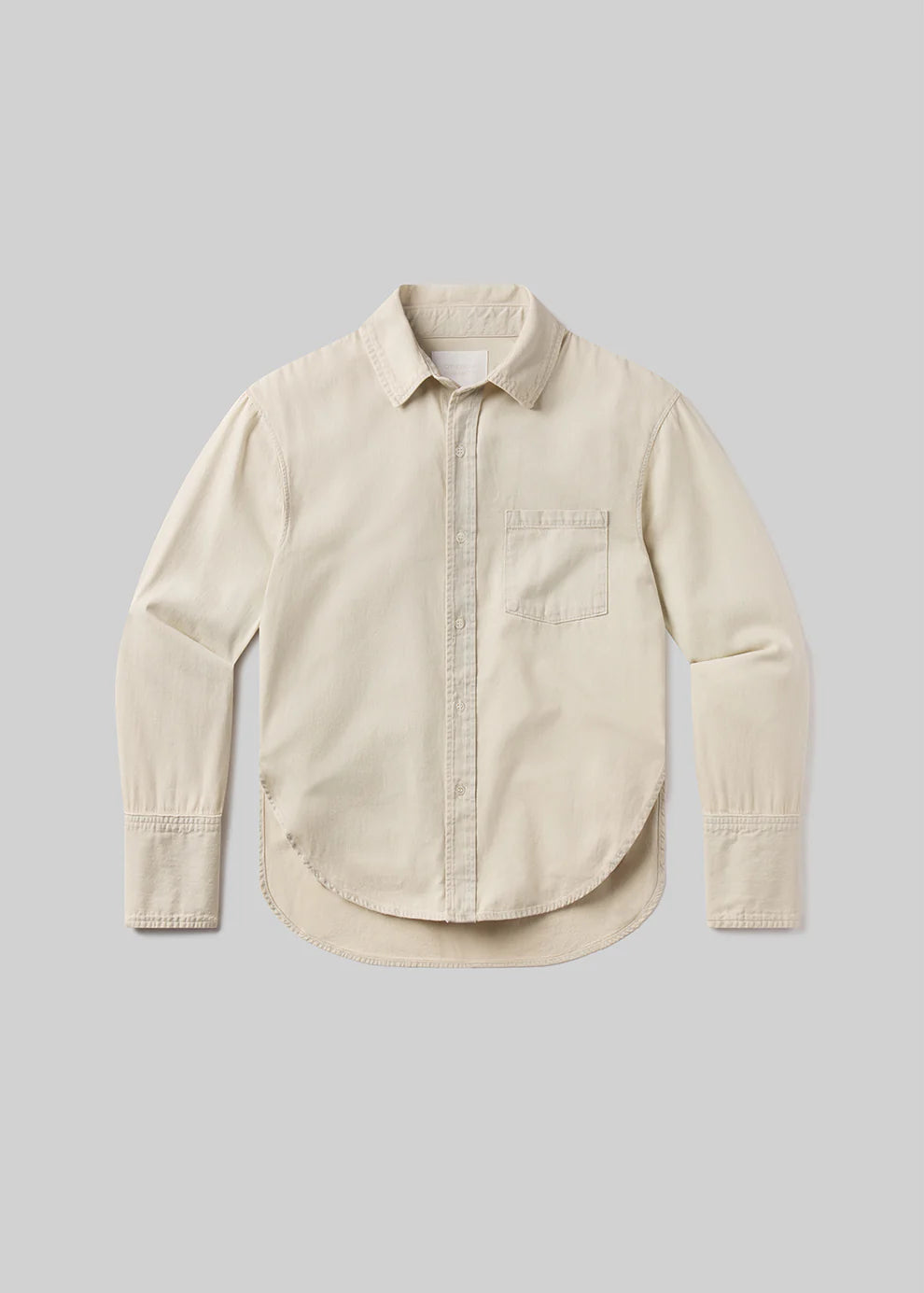 Beige shirt on a light gray background