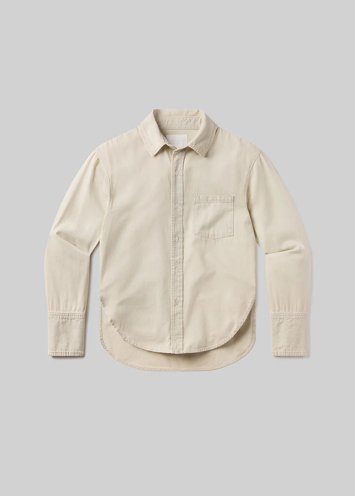 Beige shirt on a light gray background