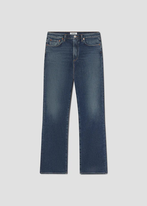 Blue jeans on a light gray background