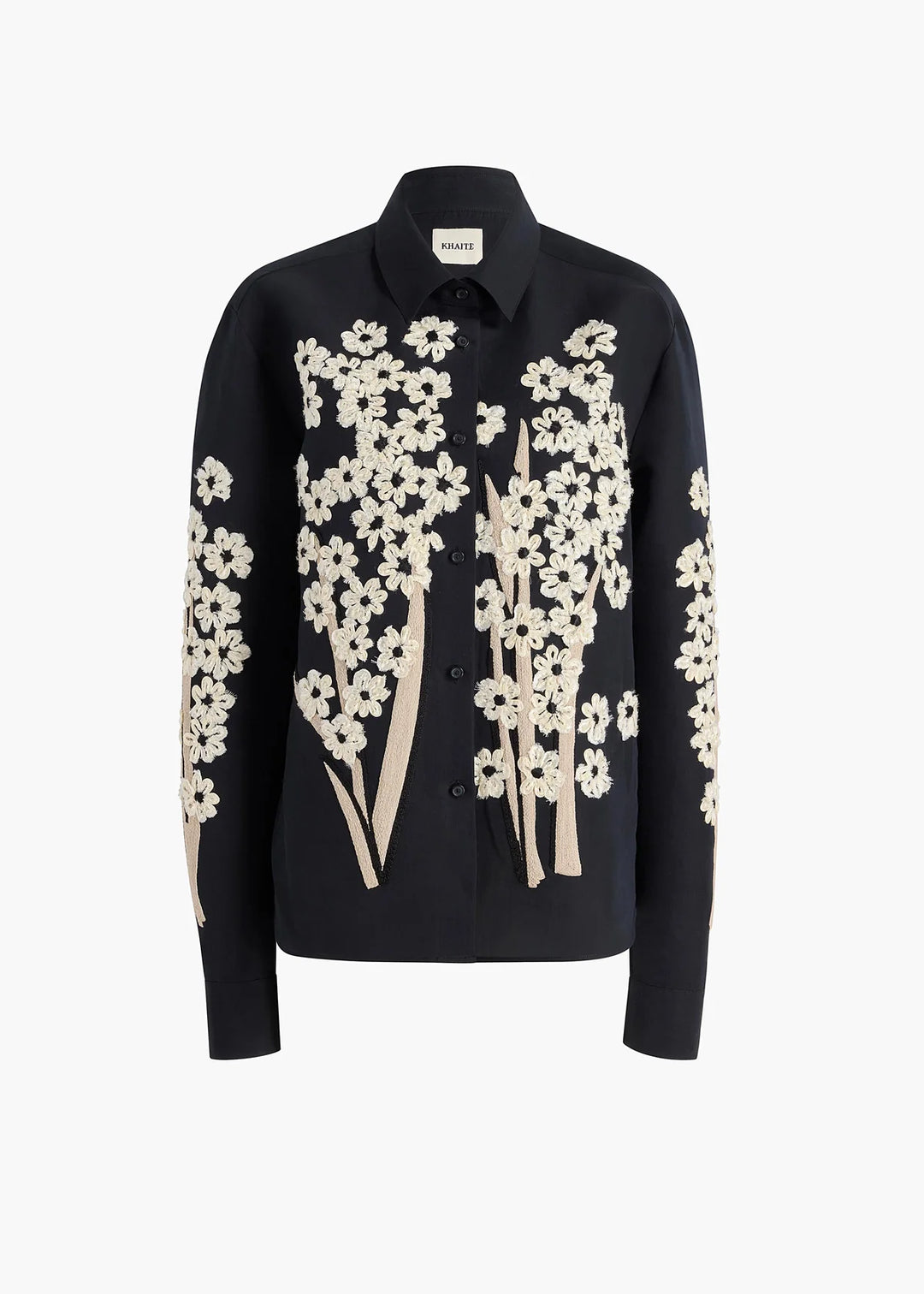 Black shirt with white floral patterns on a white background