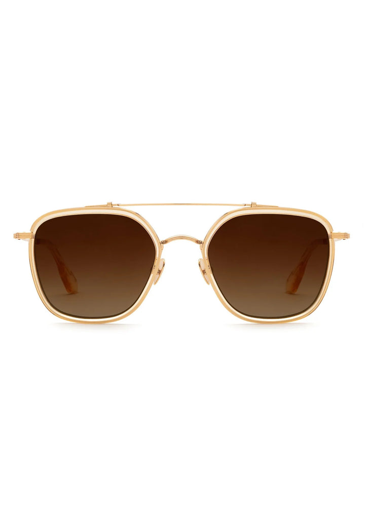 Gold-framed sunglasses with brown lenses on a white background