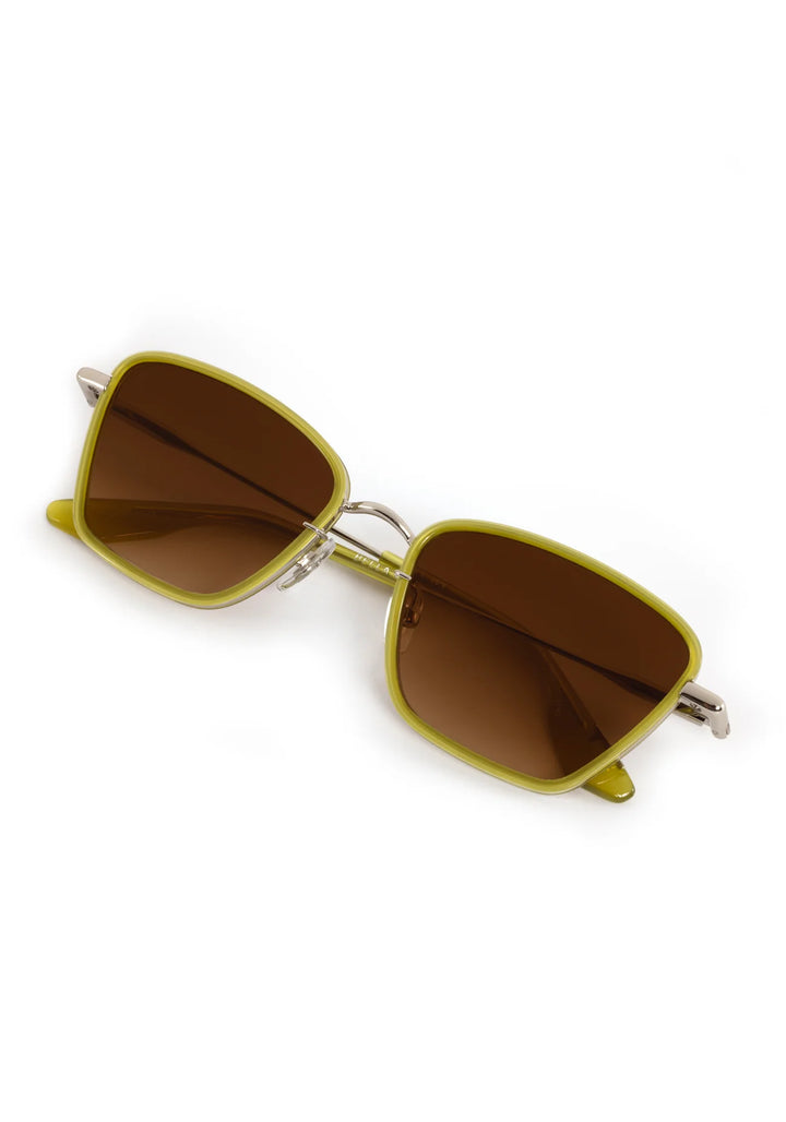 Sunglasses with green frames and brown lenses on a white background