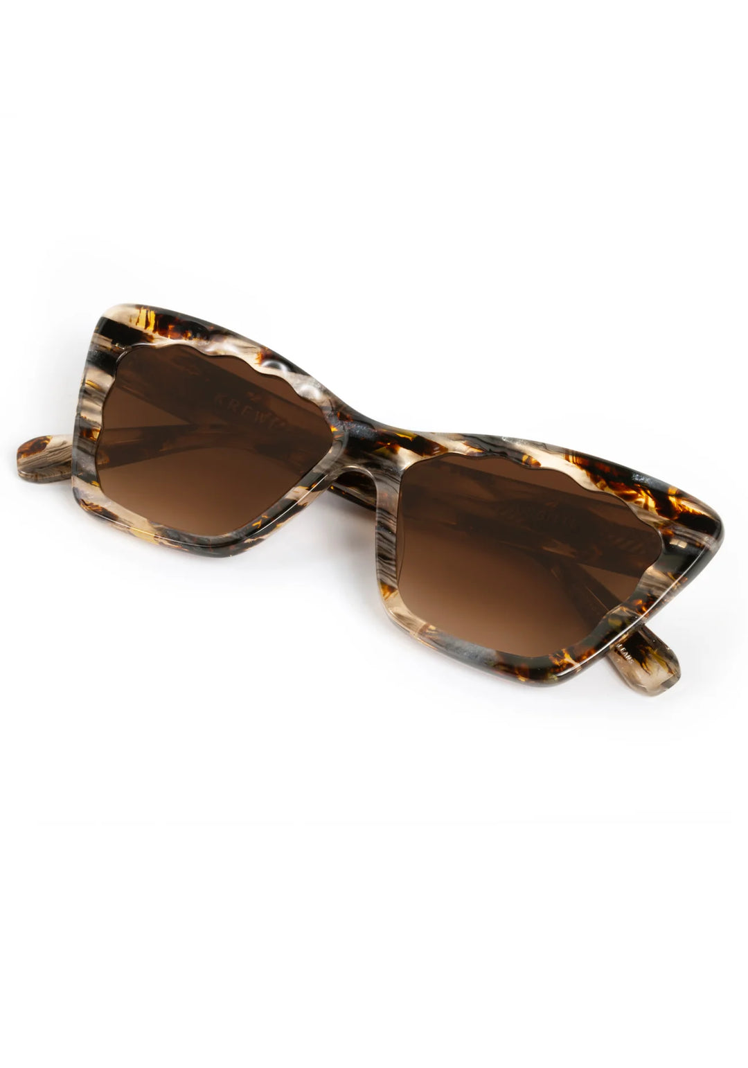 Sunglasses with tortoiseshell frame and brown lenses on a white background