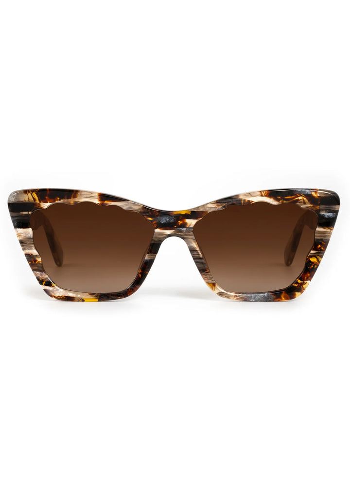 Tortoiseshell sunglasses with brown lenses on a white background