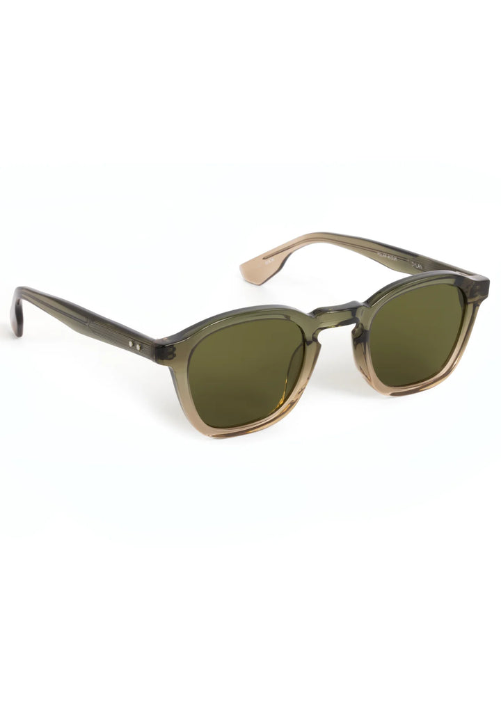 Sunglasses with brown frame and green lenses on a white background