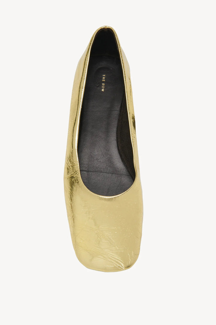 THE ROW SQUARE BALLET IN GOLD LEATHER