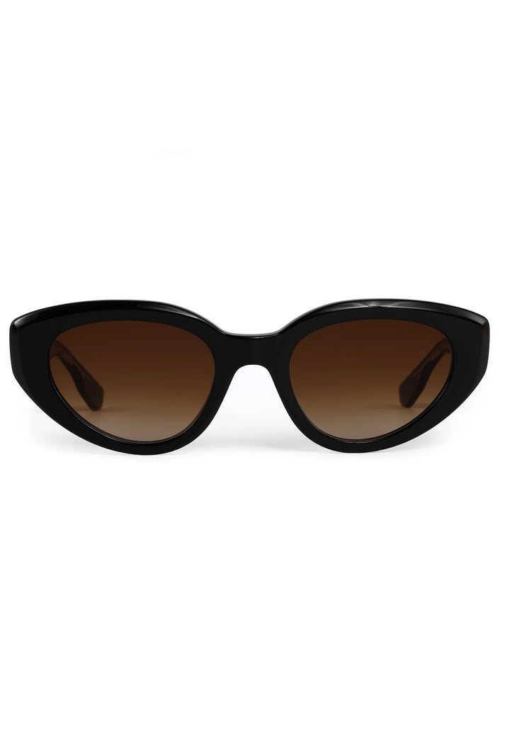 Black cat-eye sunglasses with brown gradient lenses on a white background
