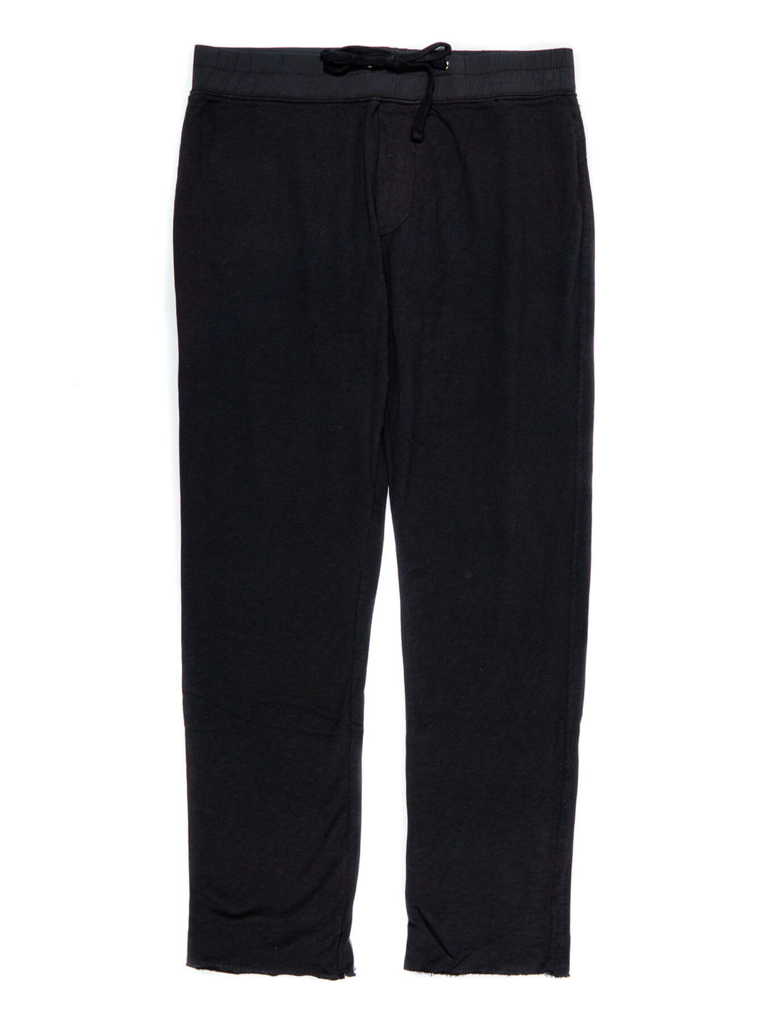 A pair of black French terry sweatpants with a drawstring waist and elastic ankle cuffs.