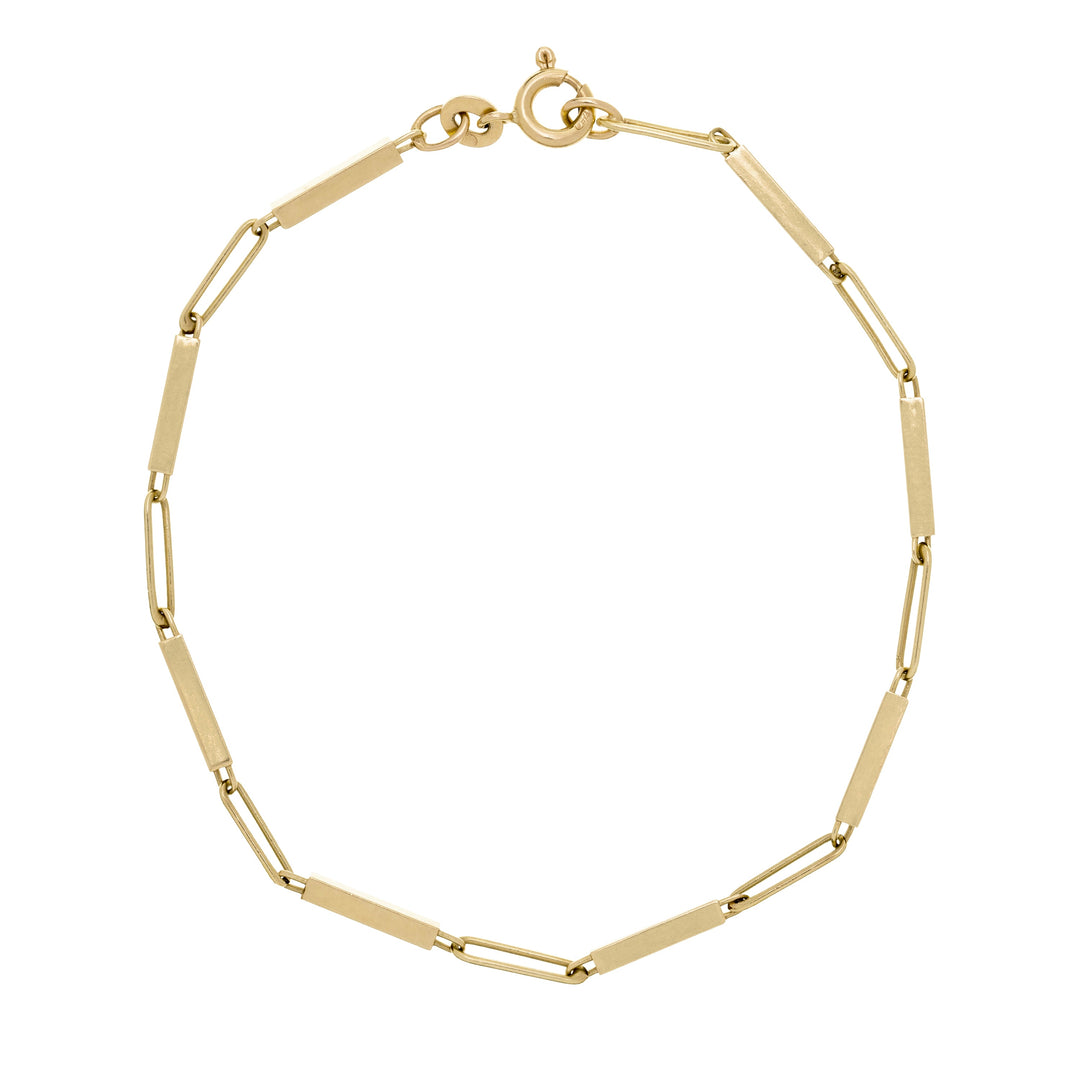 Gold bracelet on a white background