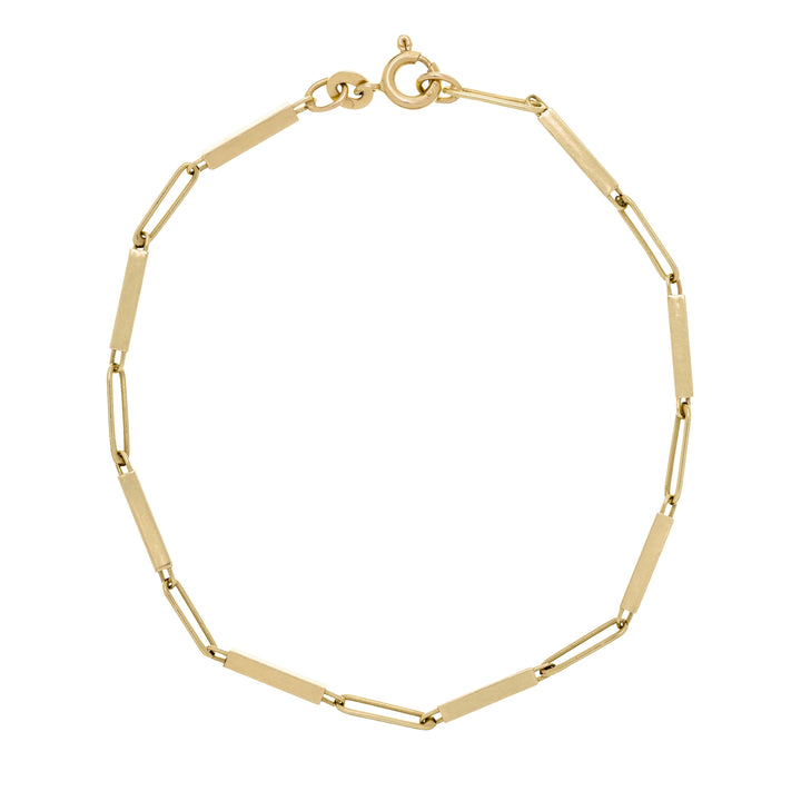 Gold bracelet on a white background