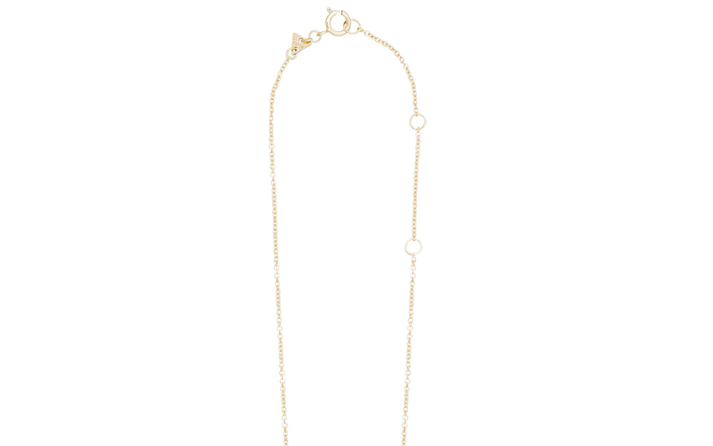 Gold necklace with small pearls on a white background