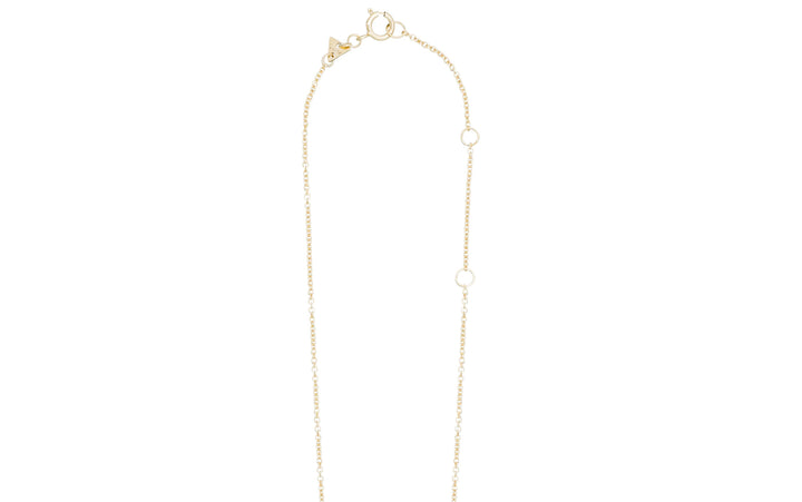 Gold necklace with small pearls on a white background