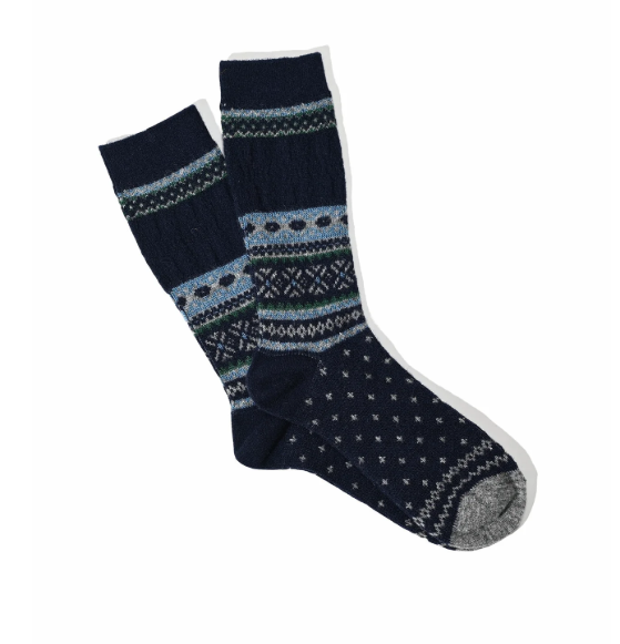 Pair of navy blue socks with patterned design on a white background