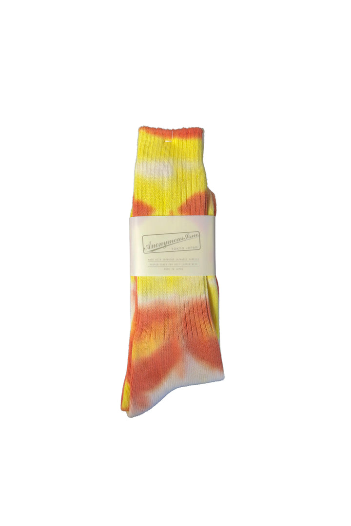 Colorful tie-dye sock with a white label on a white background