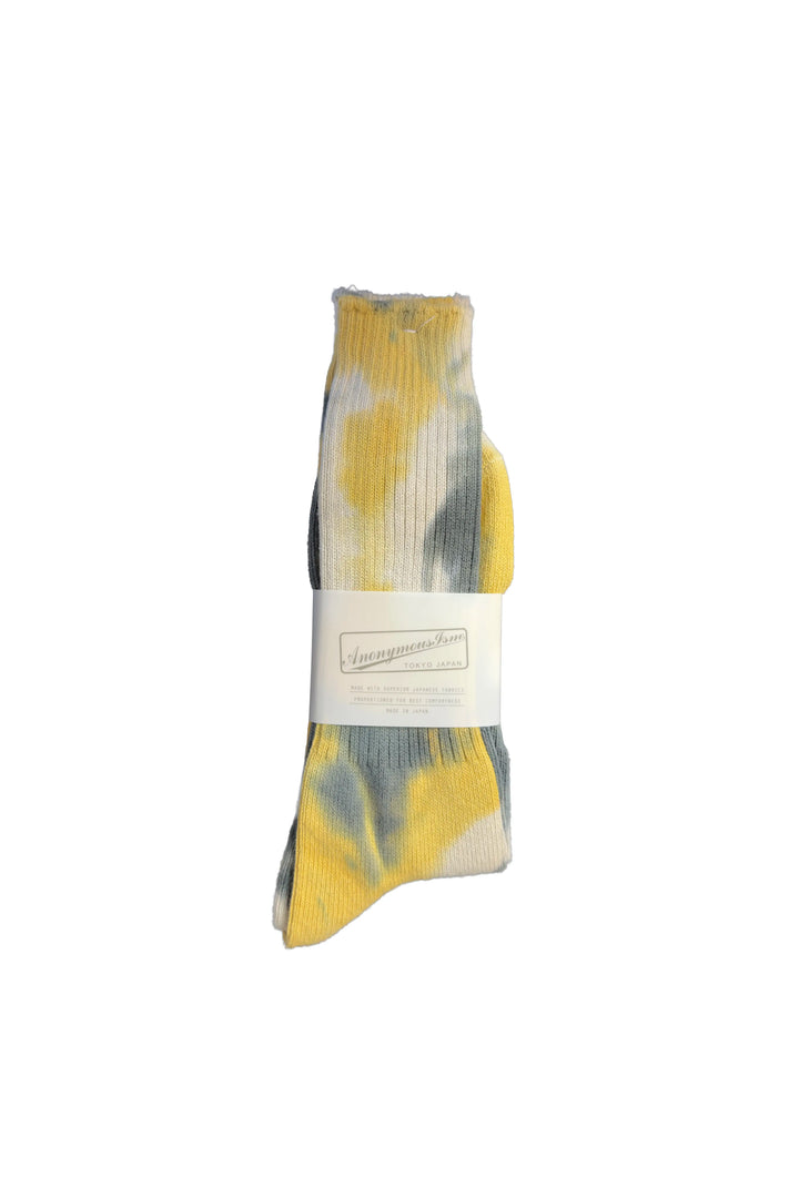 Tie-dye sock with a white label on a white background