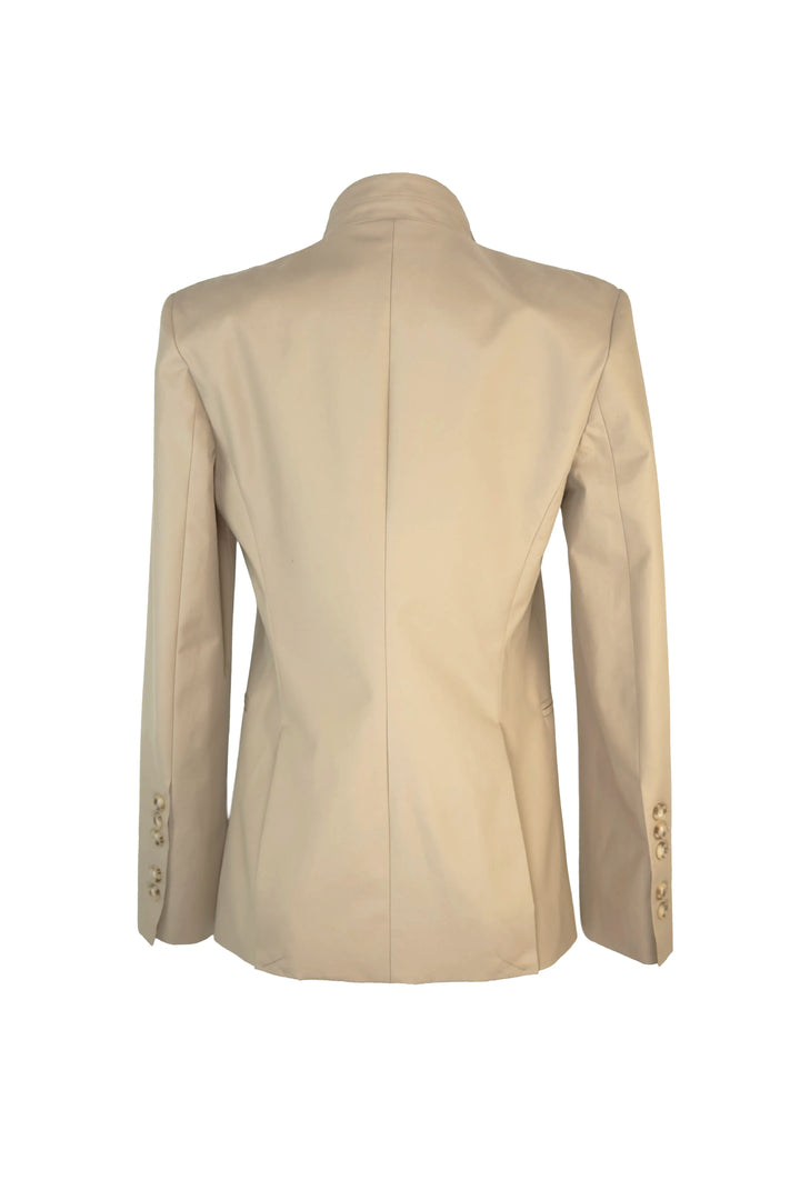 Beige blazer on a mannequin against a white background