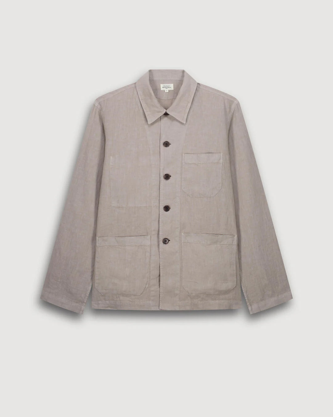 Beige jacket with button details on a light gray background