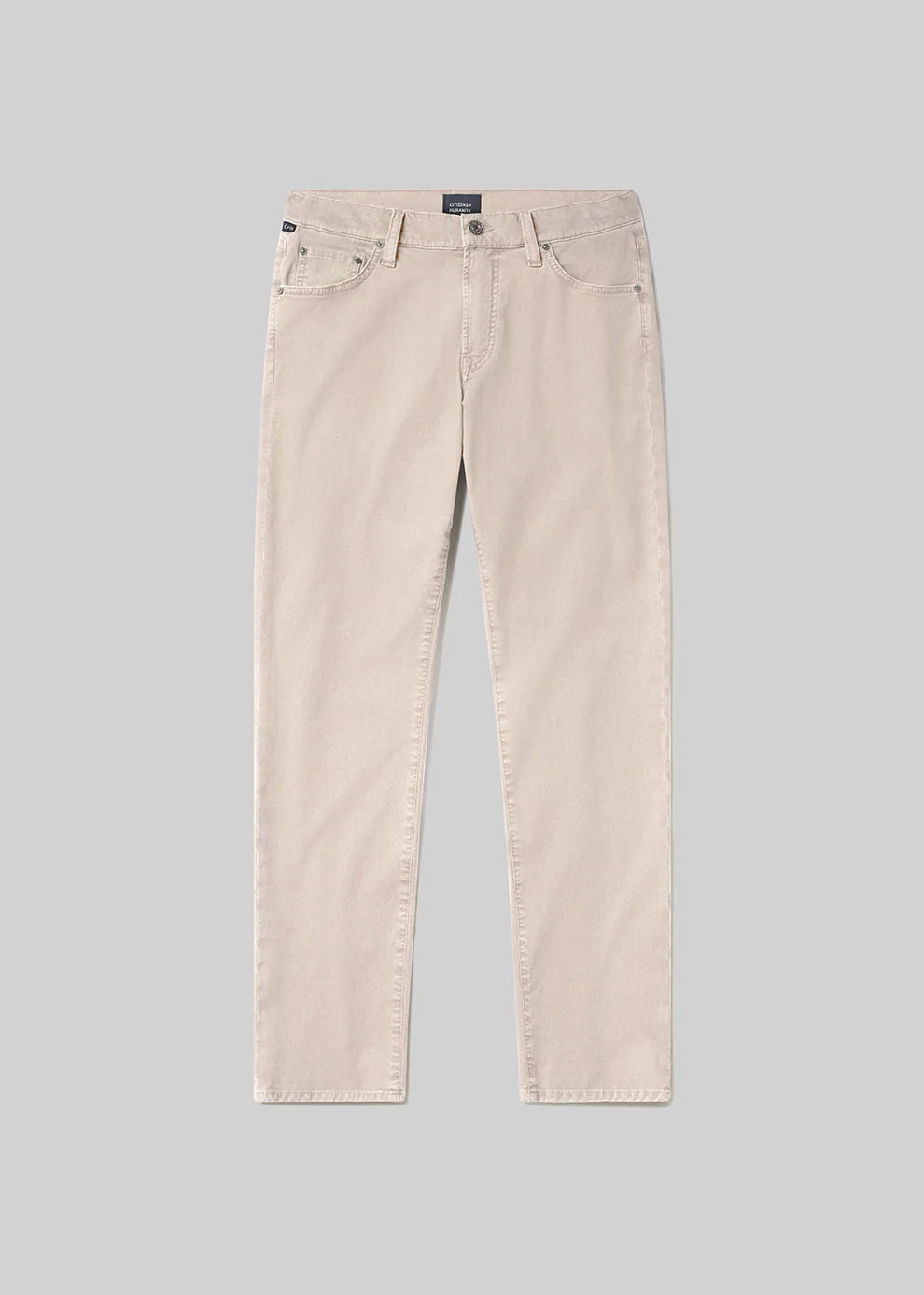 Beige jeans on a gray background