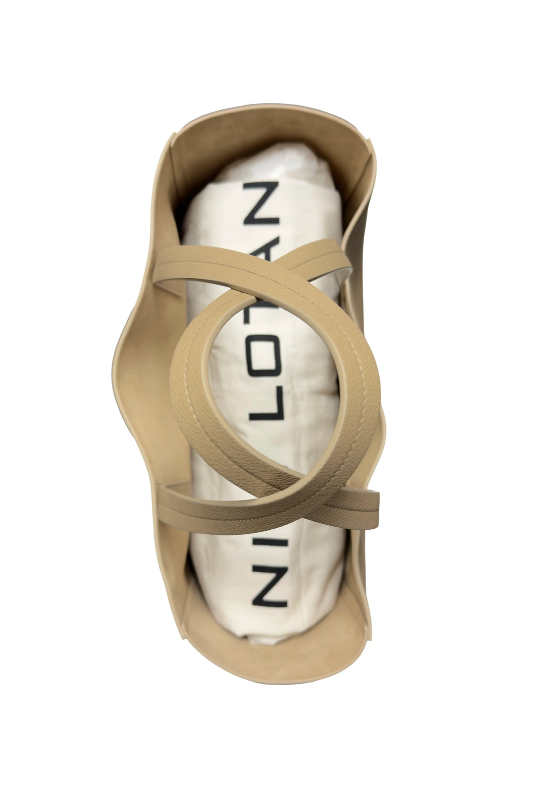 Beige sandal with a white insole featuring black text on a white background