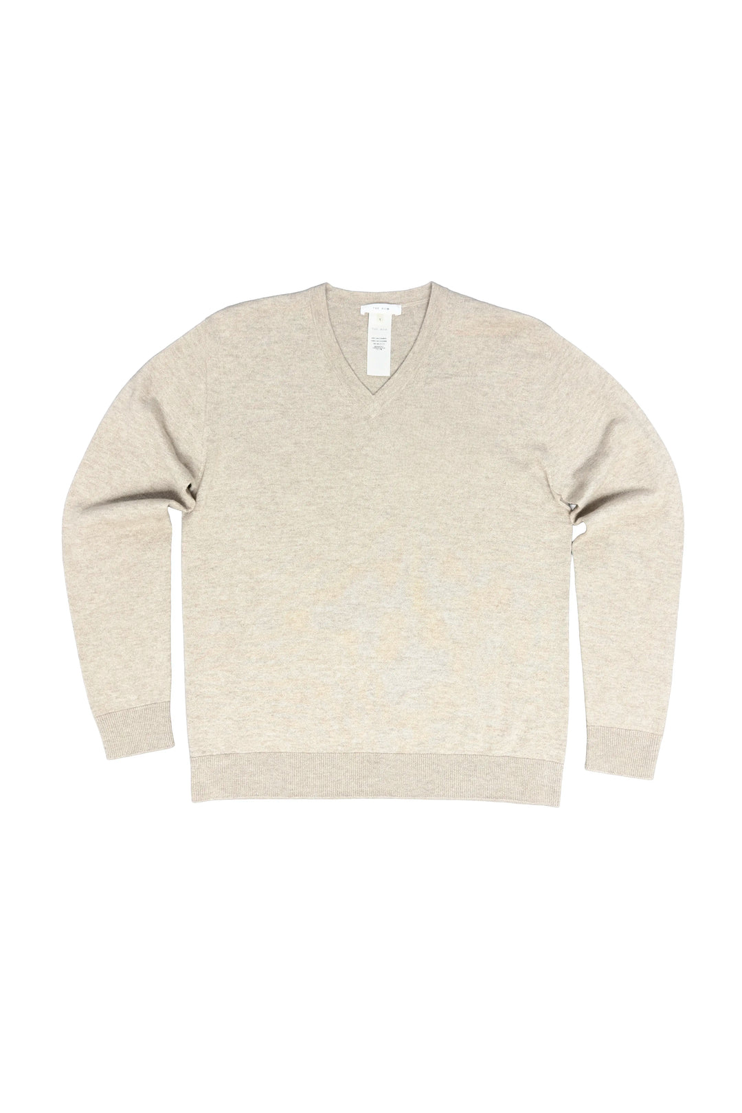 Beige sweater on a white background