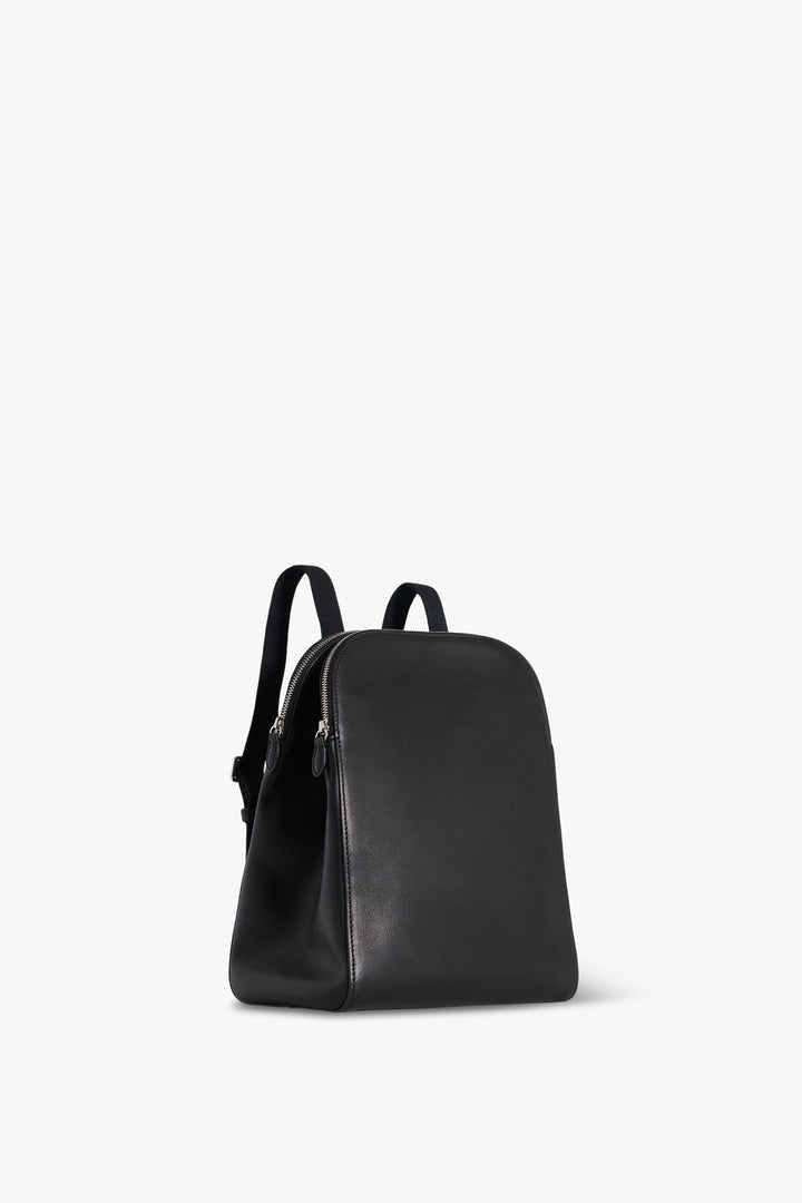 Black backpack on a white background