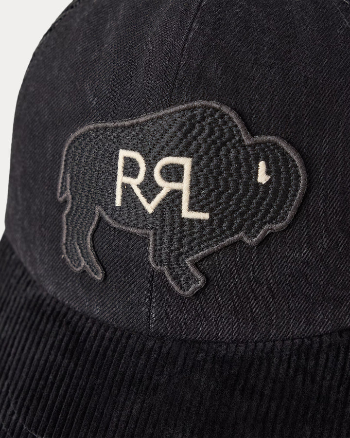 Black beanie with a embroidered logo of a bison and 'RRL' initials on a white background