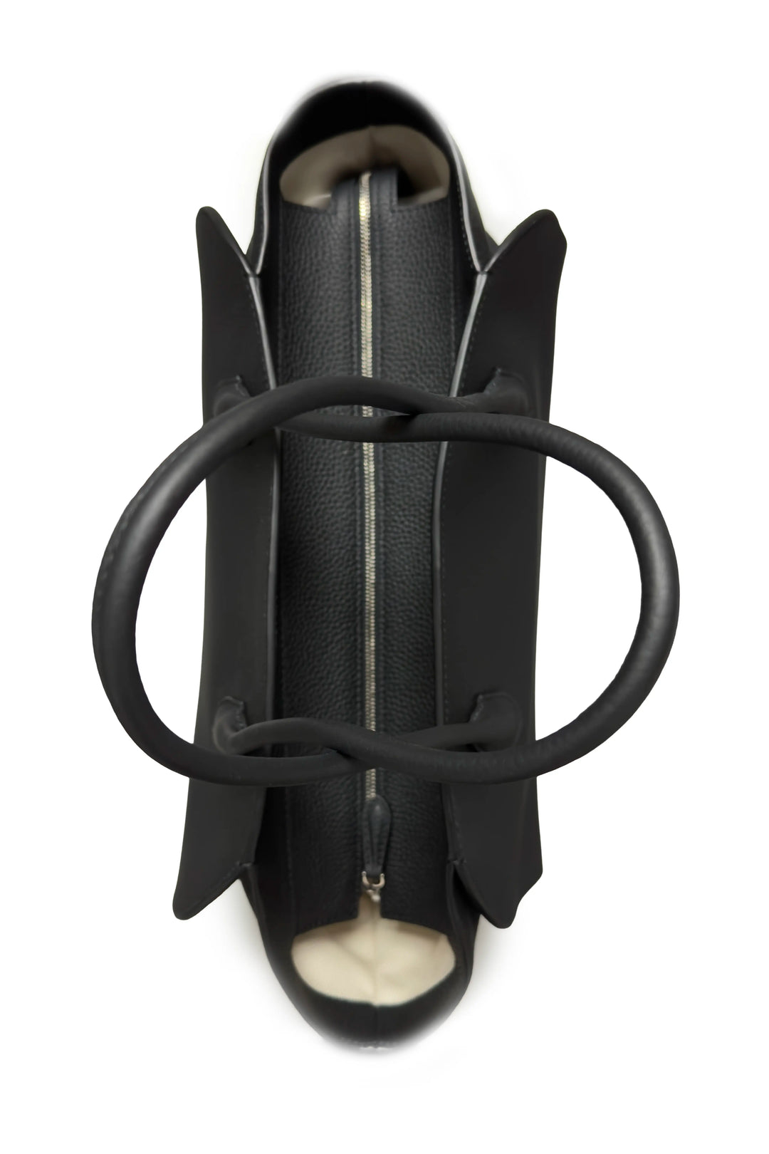 Black high-heeled shoe with unique design on a white background