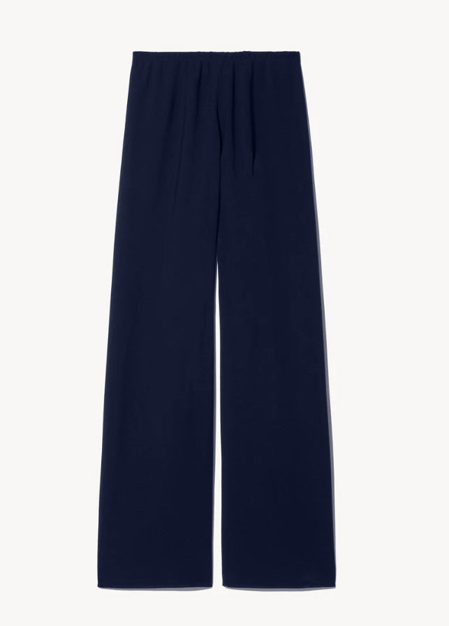 Black pants on a light gray background