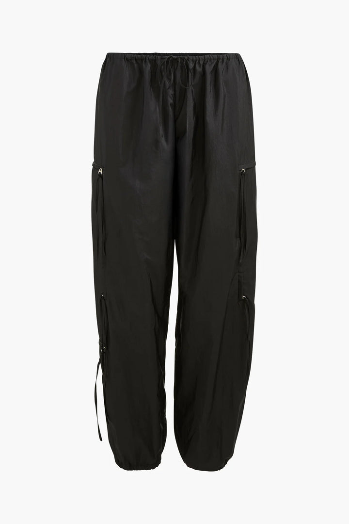 Black pants with zippers on a white background