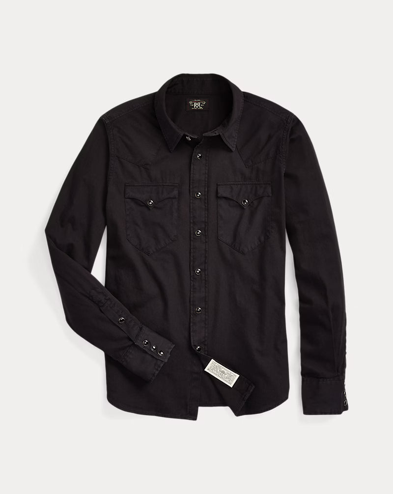 Black shirt with button details on a light gray background
