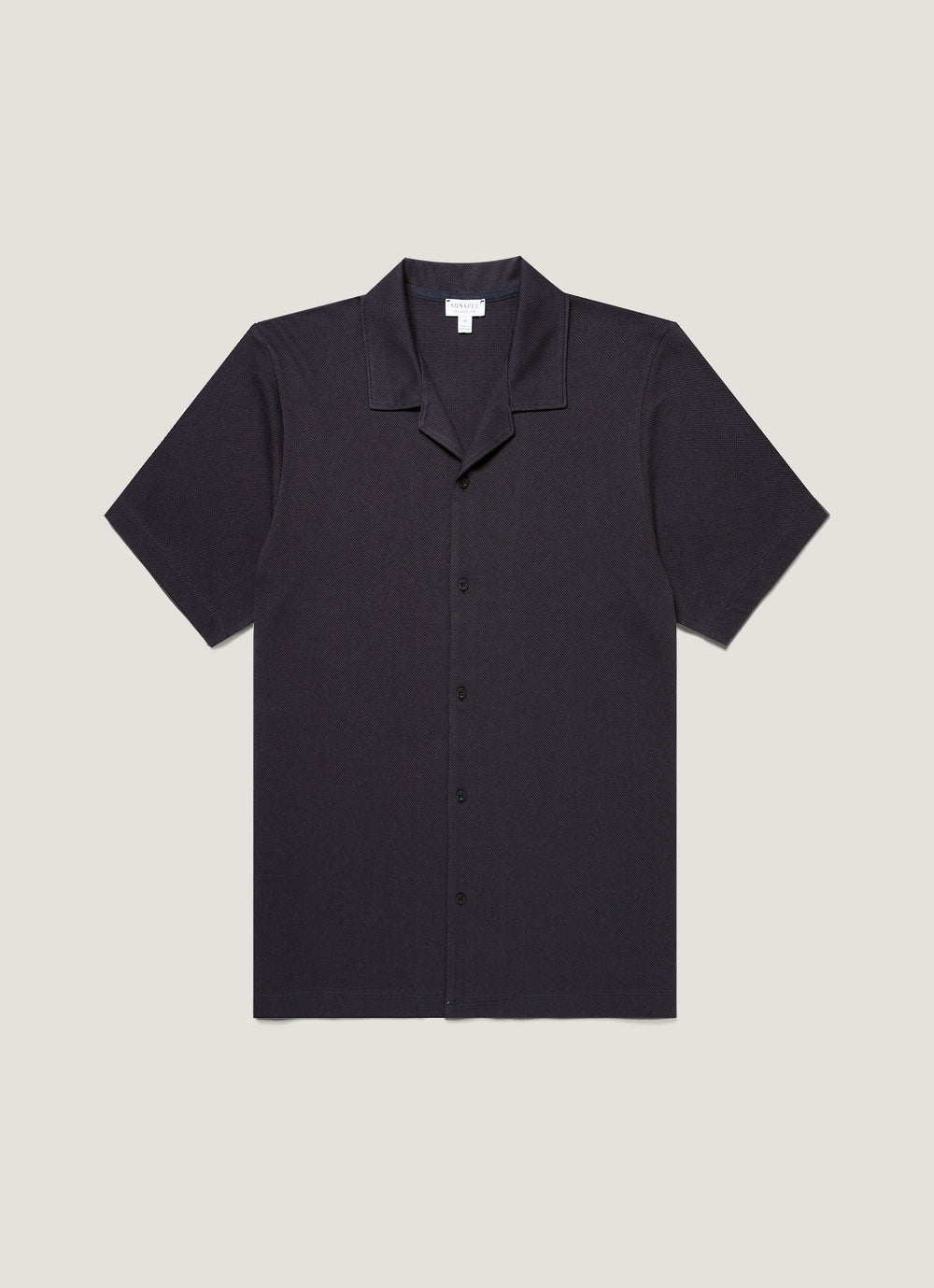 Black short-sleeve shirt on a light gray background