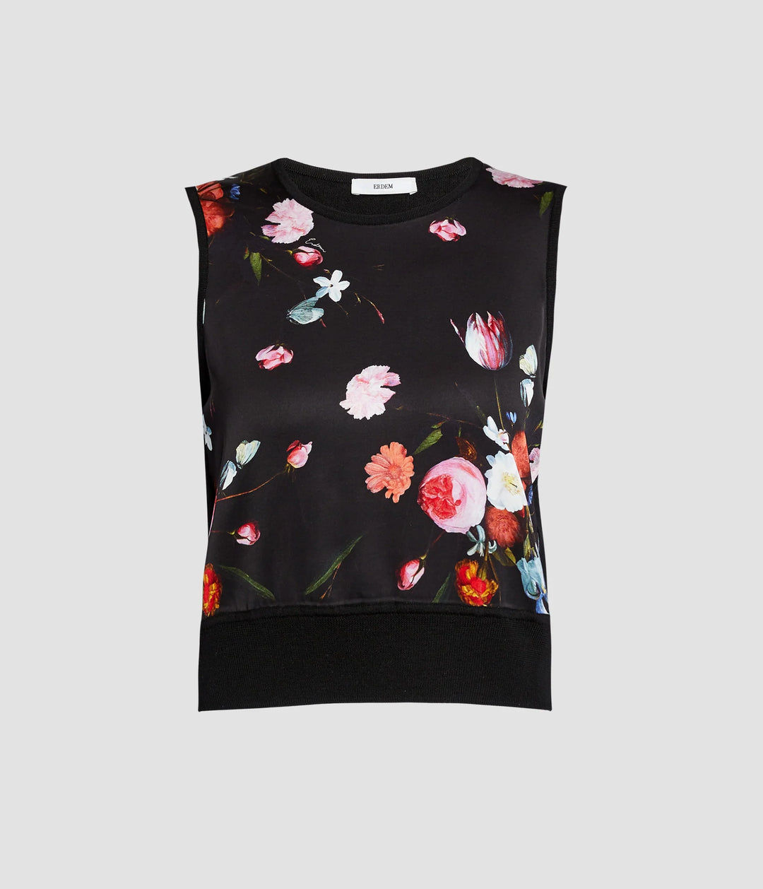 Black sleeveless top with colorful floral pattern on a light gray background