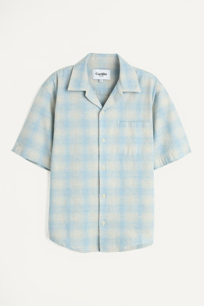 Blue and white checkered shirt with 'Corridor' label on a white background