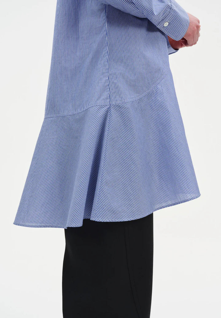 Blue and white striped shirt with a flared skirt on a plain background