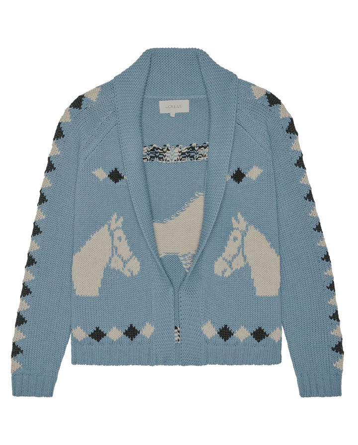 Blue cardigan with horse pattern on a white background