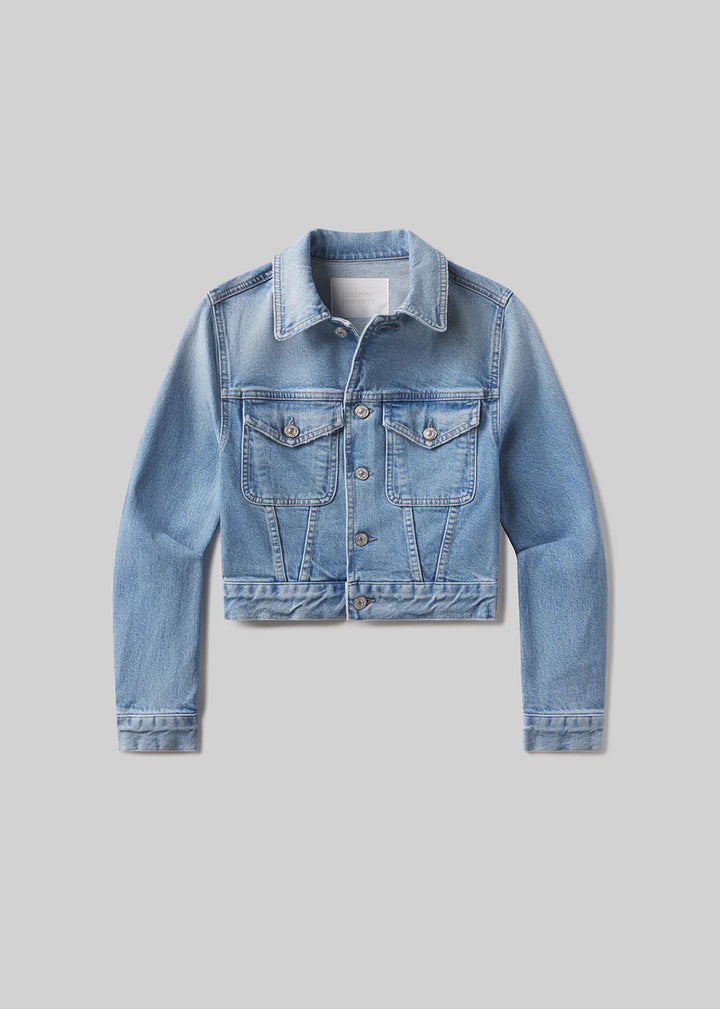 Blue denim jacket on a gray background