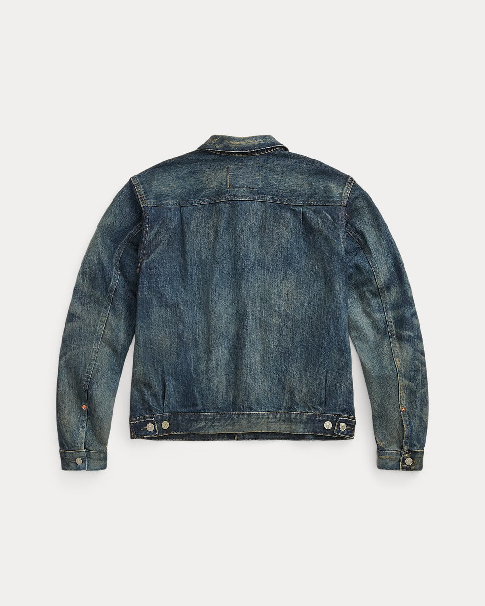Blue denim jacket on a light gray background