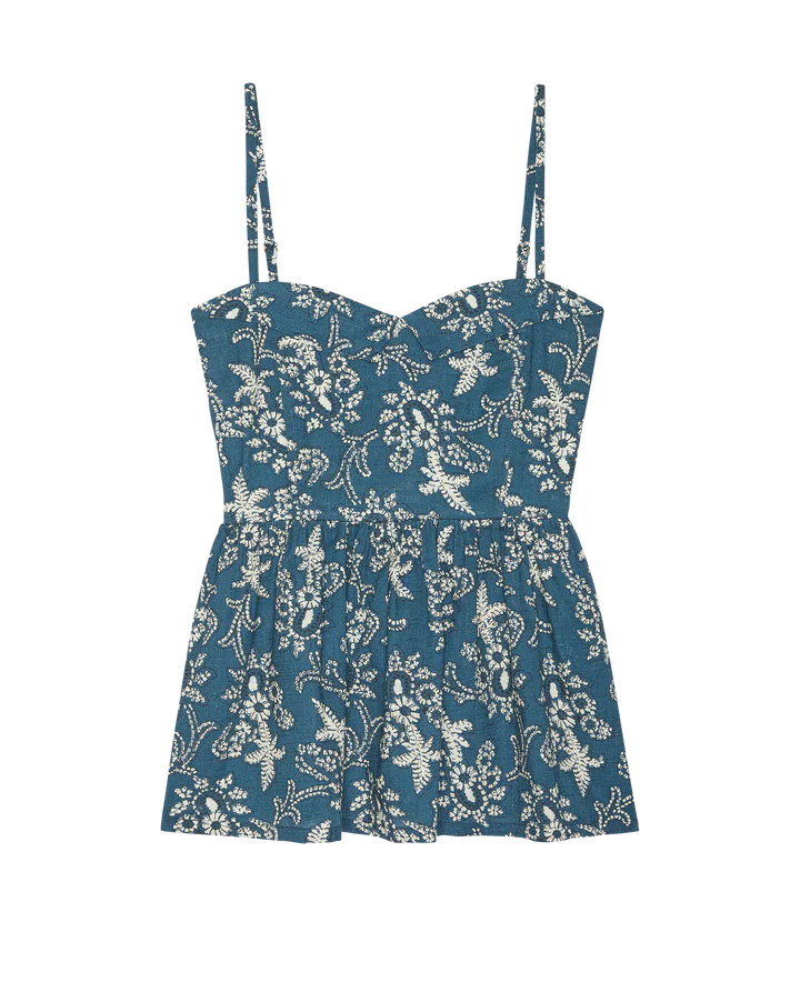 Blue floral dress with thin straps on a white background
