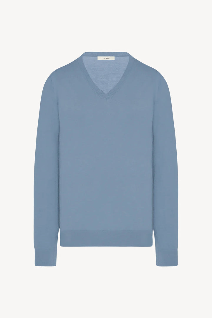 Blue sweater on a white background