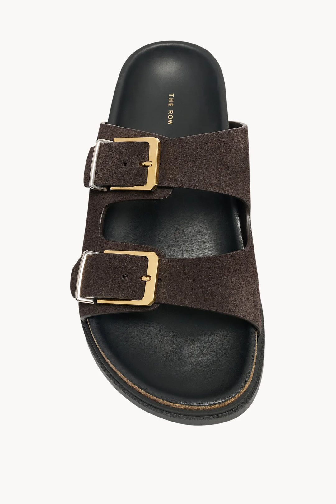 Brown sandal with gold buckles on a white background