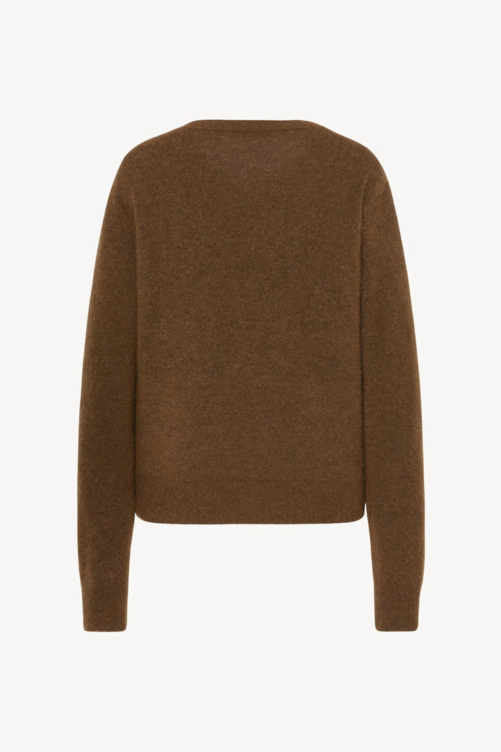Brown sweater on a white background