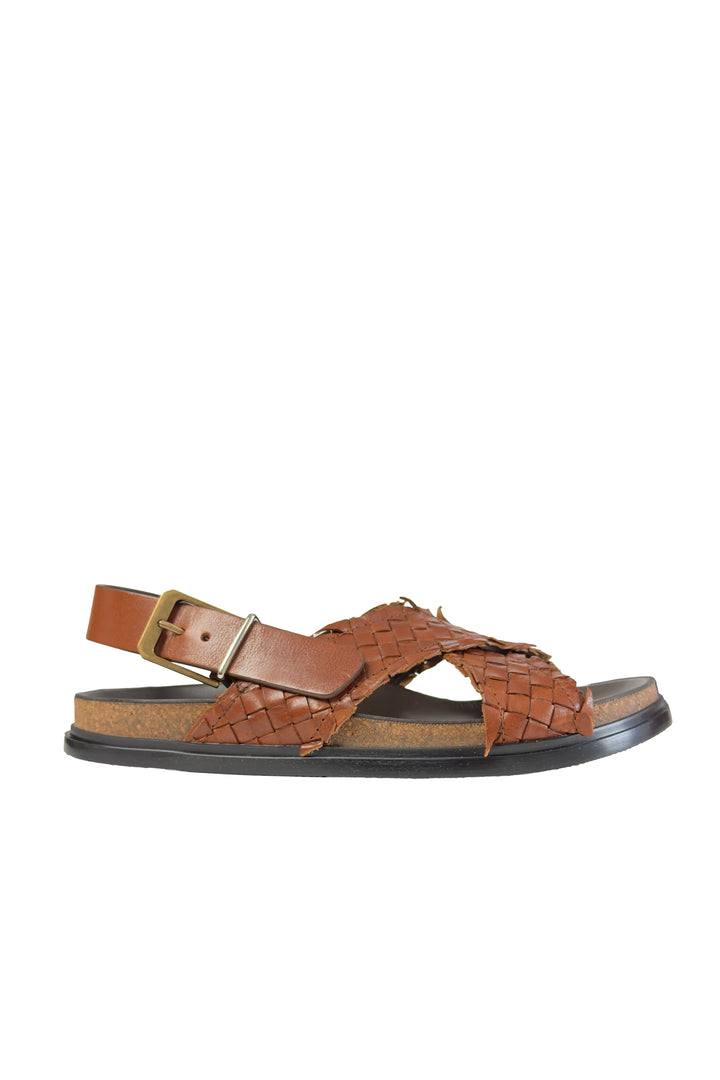 Brown woven sandal on a white background