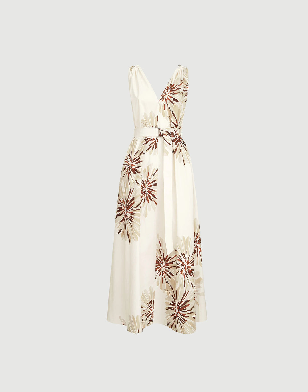 White dress with red floral pattern on a light gray background
