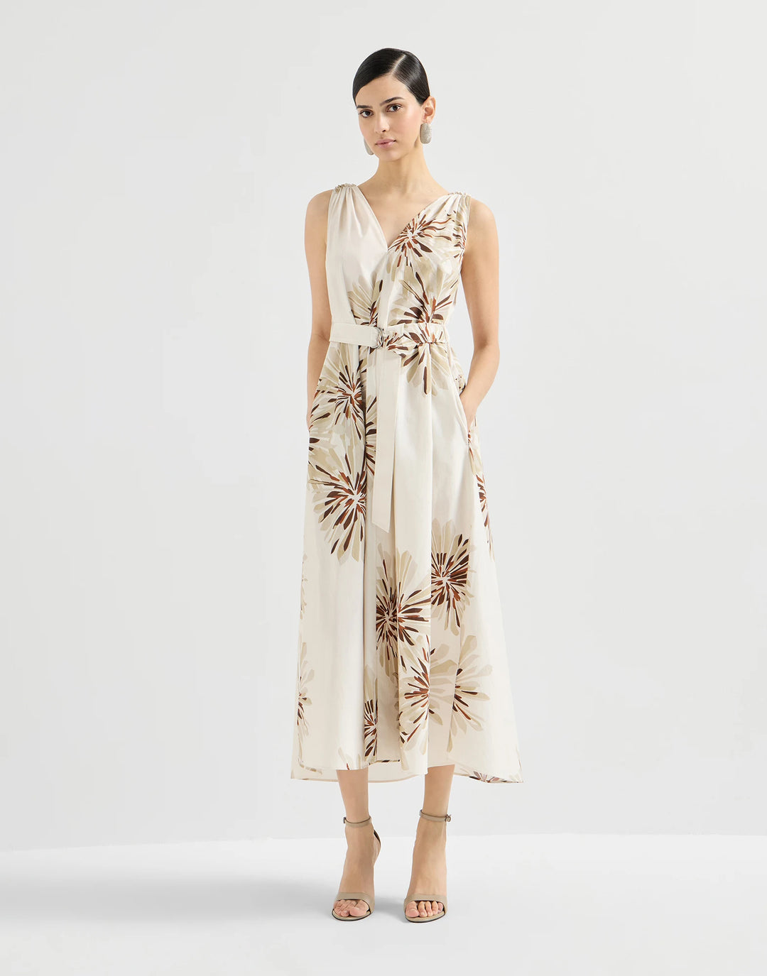 Woman wearing a floral dress on a white background