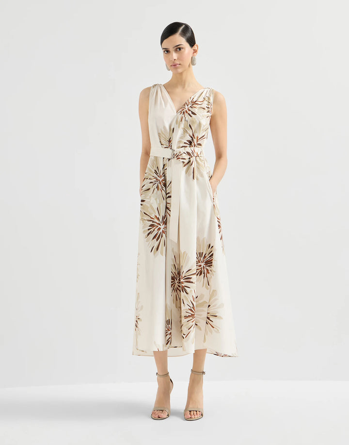 Woman wearing a floral dress on a white background