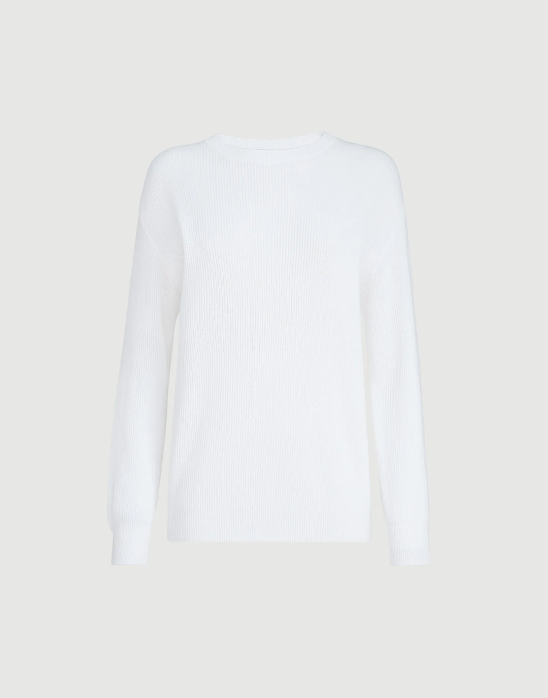 White long-sleeve shirt on a light beige background